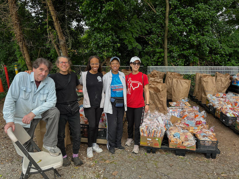 Pam Noud, second from the left, stands with a group of volunteers. | Photography by Florencia Tuchin