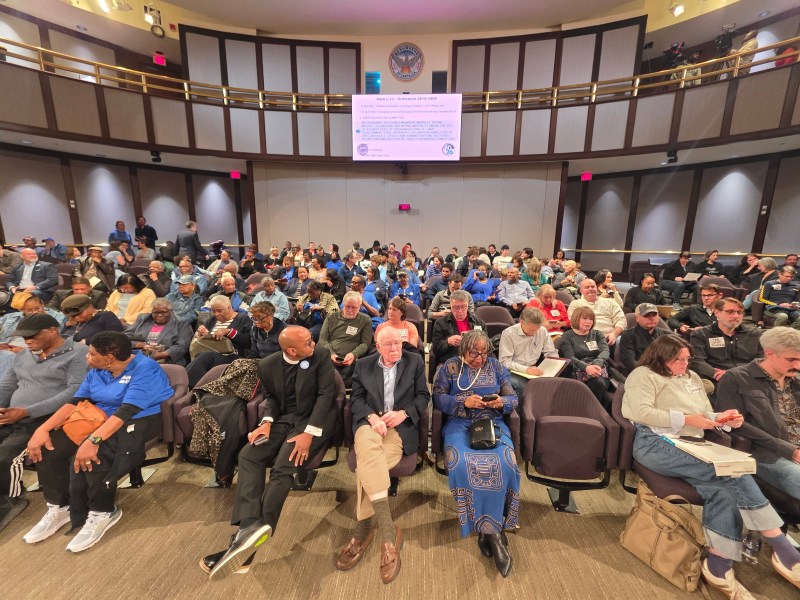 A photographed of a packed Atlanta City Council chambers.