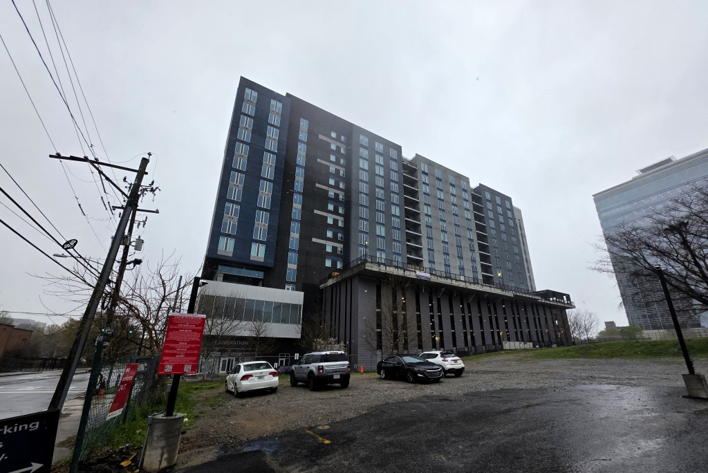 A photo of the Generation Atlanta apartments on a gloomy day.